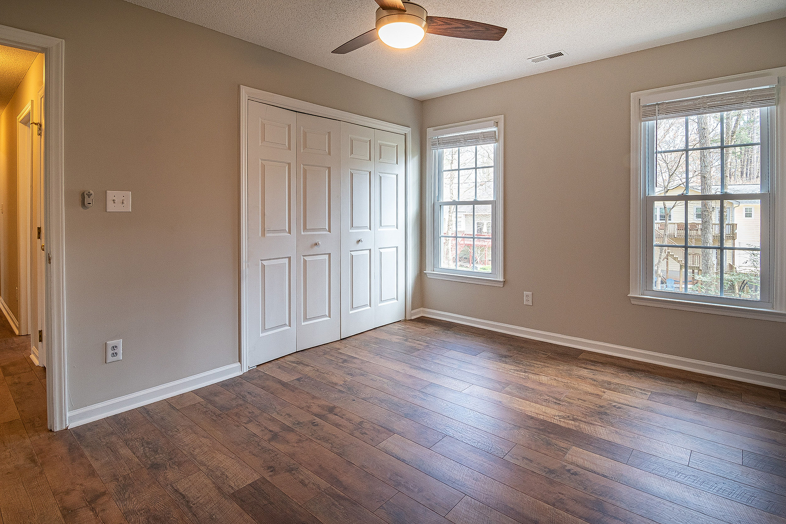 Newly installed hardwood floors in a bright living space